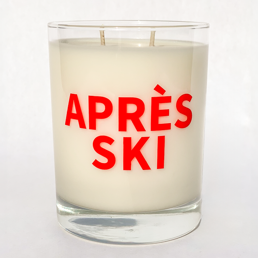 Double wicked soy candle in a 13.5 oz tumbler with "Apres Ski" printed on the face.. SEO Text – Drinking glass, soy wax candle, Christmas Candle, hand poured, small batch, scented candle, Woman Owned, local candle, Housewarming present, gives back, charity, community candle, becomes a cocktail glass, closing gift.