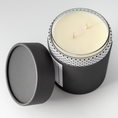 Load image into Gallery viewer, Double wicked soy wax candle inside of black packaging