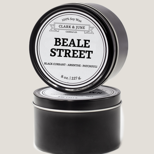 Single wicked 8oz candle in a black finish with Beale Street  on the label. SEO Text –soy wax candle, Tennessee candle, hand poured, small batch, scented candle, Woman Owned, local candle, Housewarming present, gives back, charity, community candle, closing gift.