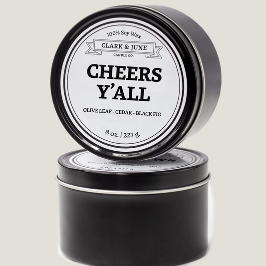 Single wicked 8oz candle in a black finish with “Cheers Y’All ” on the label. SEO Text –soy wax candle, Alabama candle, hand poured, small batch, scented candle, Woman Owned, local candle, Housewarming present, gives back, charity, community candle, closing gift.