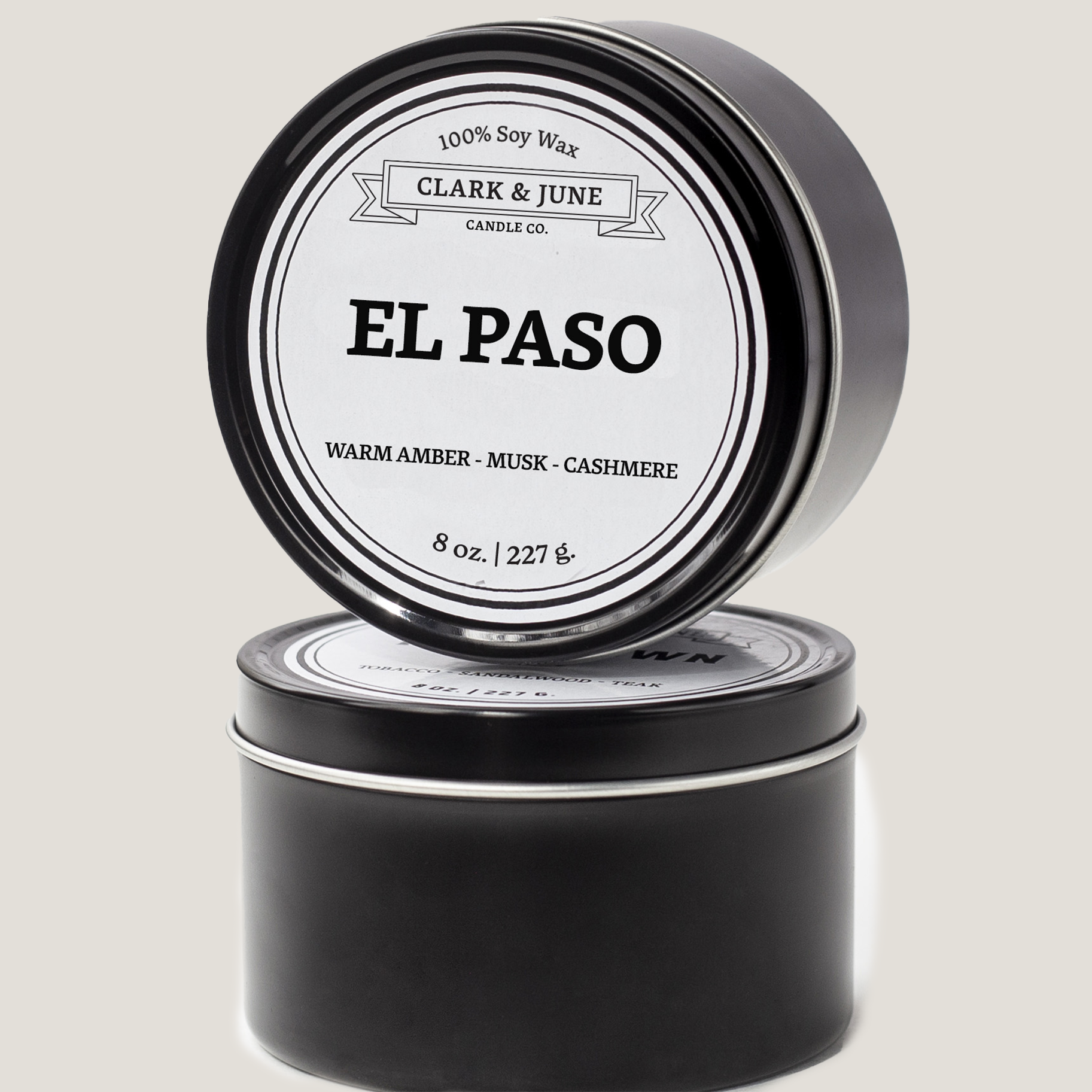 Single wicked 8oz candle in a black finish with El Paso  on the label. SEO Text –soy wax candle, Texas candle, hand poured, small batch, scented candle, Woman Owned, local candle, Housewarming present, gives back, charity, community candle, closing gift.