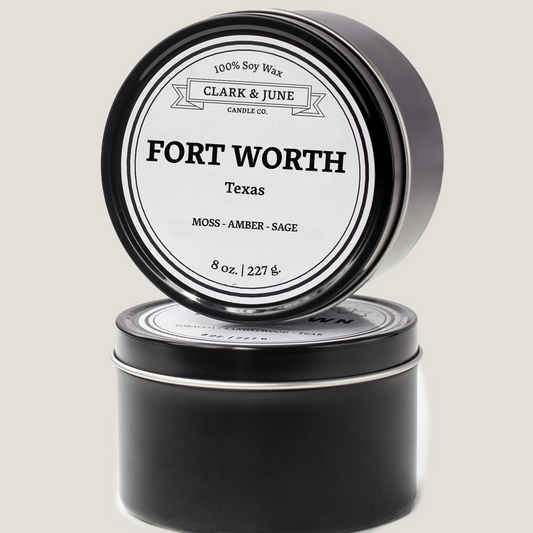 Single wicked 8oz candle in a black finish with Fort Worth  on the label. SEO Text –soy wax candle, Texas candle, hand poured, small batch, scented candle, Woman Owned, local candle, Housewarming present, gives back, charity, community candle, closing gift.