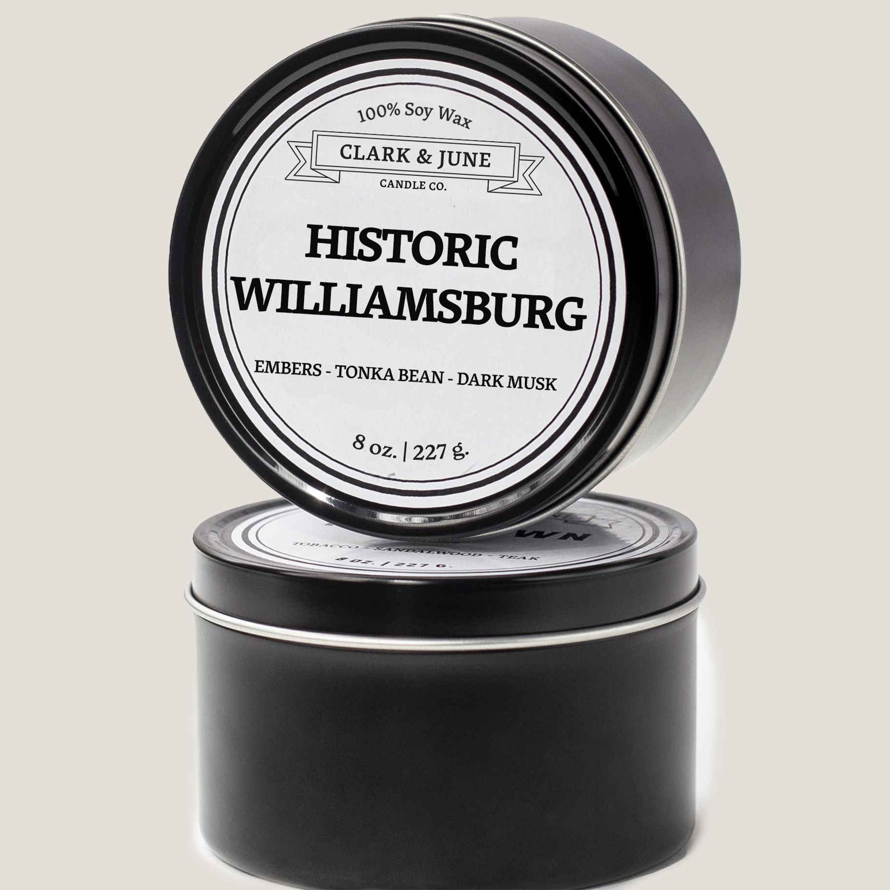 Single wicked 8oz candle in a black finish with Historic Williamsburg on the label. SEO Text –soy wax candle, Virginia candle, hand poured, small batch, scented candle, Woman Owned, local candle, Housewarming present, gives back, charity, community candle, closing gift.
