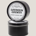 Load image into Gallery viewer, Single wicked 8oz candle in a black finish with LoudoUn County  on the label. SEO Text –soy wax candle, Virginia candle, hand poured, small batch, scented candle, Woman Owned, local candle, Housewarming present, gives back, charity, community candle, closing gift.