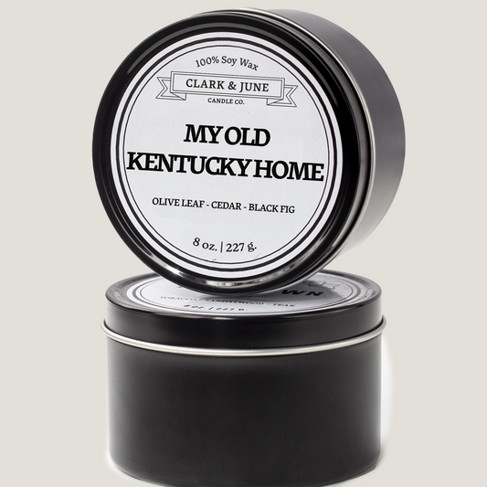 Single wicked 8oz candle in a black finish with “My Old Kentucky Home” on the label. SEO Text –soy wax candle, Alabama candle, hand poured, small batch, scented candle, Woman Owned, local candle, Housewarming present, gives back, charity, community candle, closing gift.