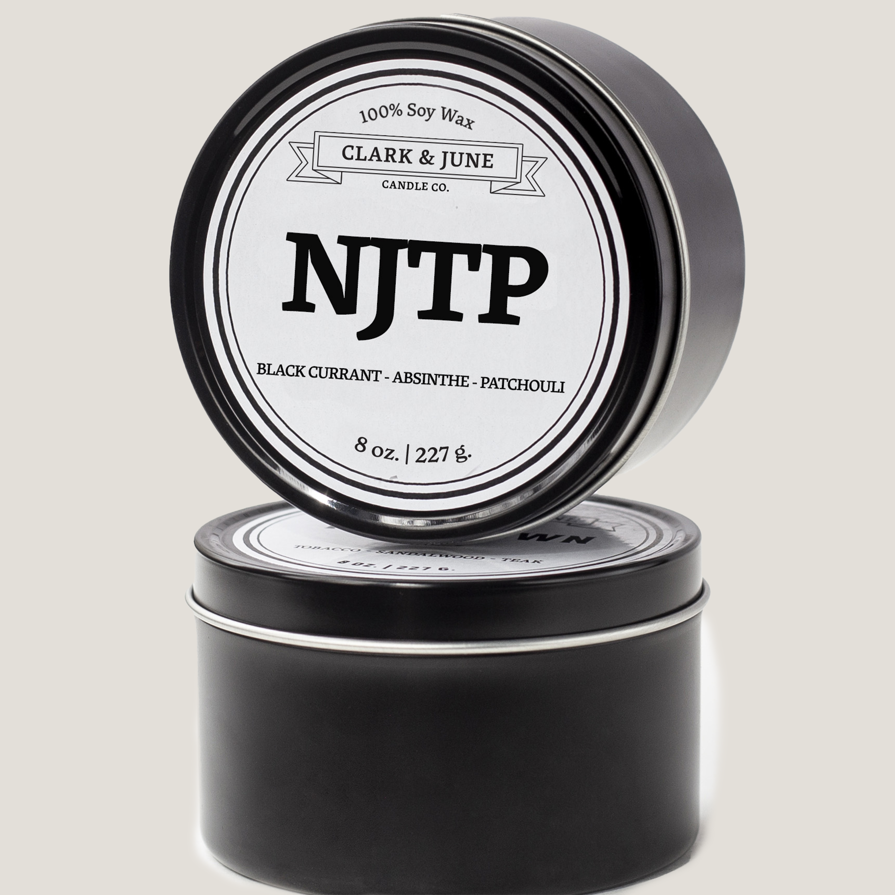 Single wicked 8oz candle in a black finish with NJTP on the label. SEO Text –soy wax candle, New Jersey candle, hand poured, small batch, scented candle, Woman Owned, local candle, Housewarming present, gives back, charity, community candle, closing gift.