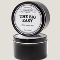 Load image into Gallery viewer, Single wicked 8oz candle in a black finish with The Big Easy on the label. SEO Text –soy wax candle, Louisiana candle, hand poured, small batch, scented candle, Woman Owned, local candle, Housewarming present, gives back, charity, community candle, closing gift.