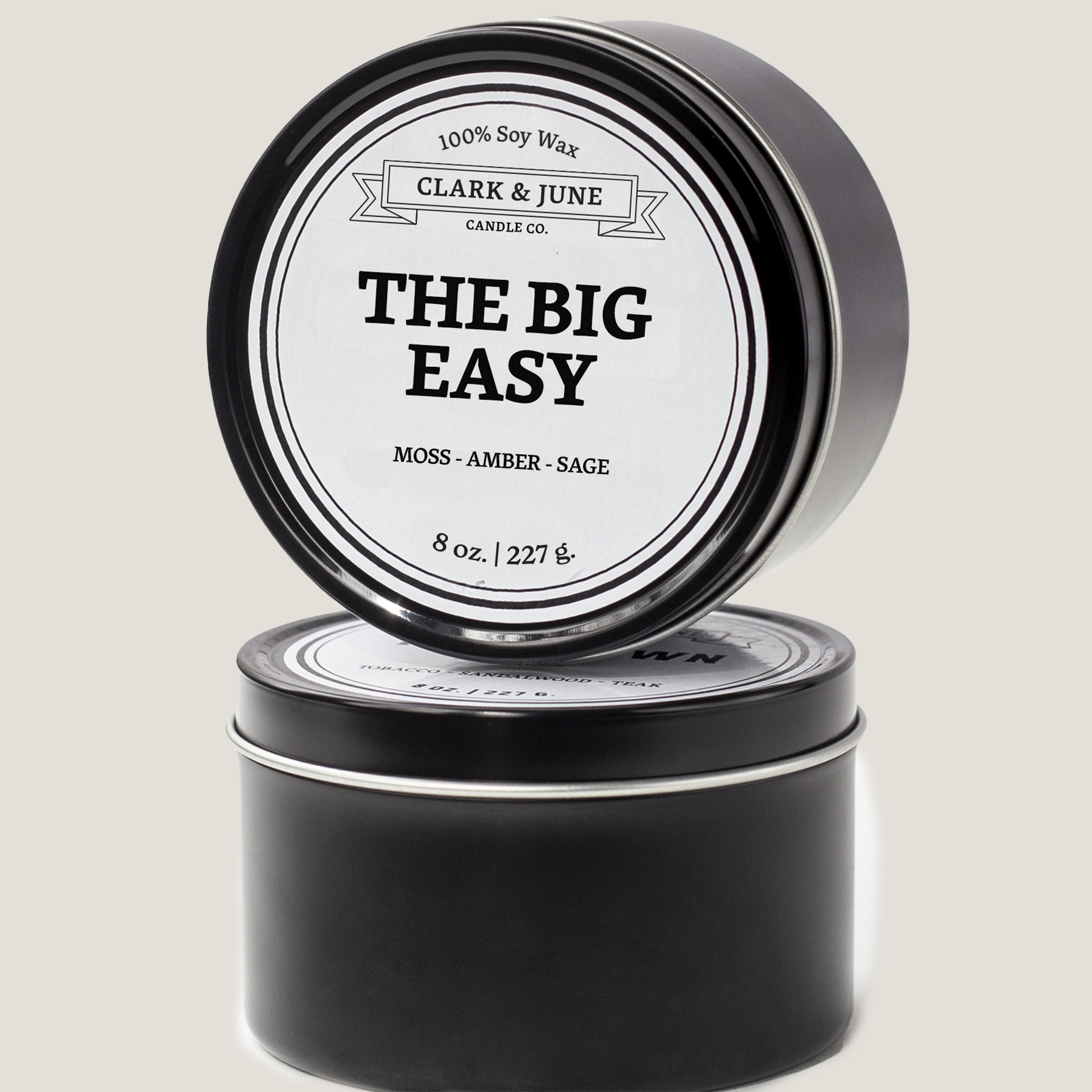 Single wicked 8oz candle in a black finish with The Big Easy  on the label. SEO Text –soy wax candle, Louisiana candle, hand poured, small batch, scented candle, Woman Owned, local candle, Housewarming present, gives back, charity, community candle, closing gift.