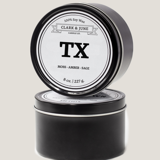 Single wicked 8oz candle in a black finish with TX on the label. SEO Text –soy wax candle, Texas candle, hand poured, small batch, scented candle, Woman Owned, local candle, Housewarming present, gives back, charity, community candle, closing gift.