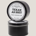 Load image into Gallery viewer, Single wicked 8oz candle in a black finish with Texan as Shit on the label. SEO Text –soy wax candle, Texas candle, hand poured, small batch, scented candle, Woman Owned, local candle, Housewarming present, gives back, charity, community candle, closing gift.