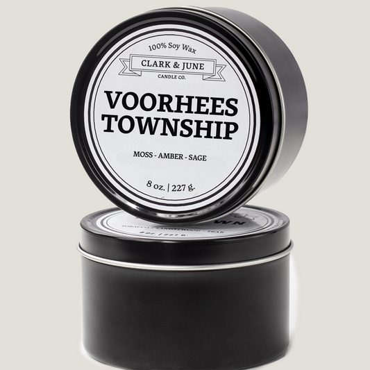 Single wicked 8oz candle in a black finish with Voorhees Township on the label. SEO Text –soy wax candle, New Jersey candle, hand poured, small batch, scented candle, Woman Owned, local candle, Housewarming present, gives back, charity, community candle, closing gift.