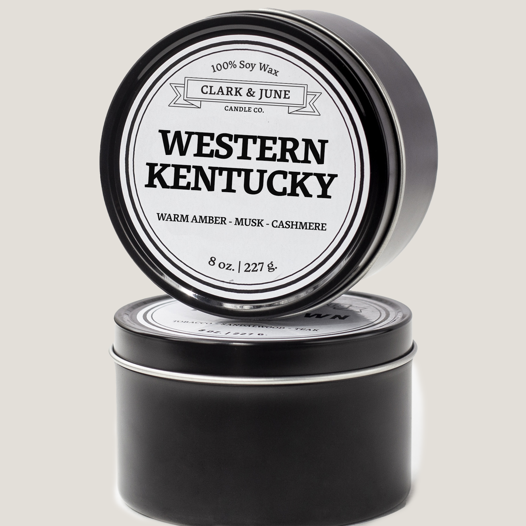 Single wicked 8oz candle in a black finish with Western Kentucky on the label. SEO Text –soy wax candle, Kentucky candle, hand poured, small batch, scented candle, Woman Owned, local candle, Housewarming present, gives back, charity, community candle, closing gift.