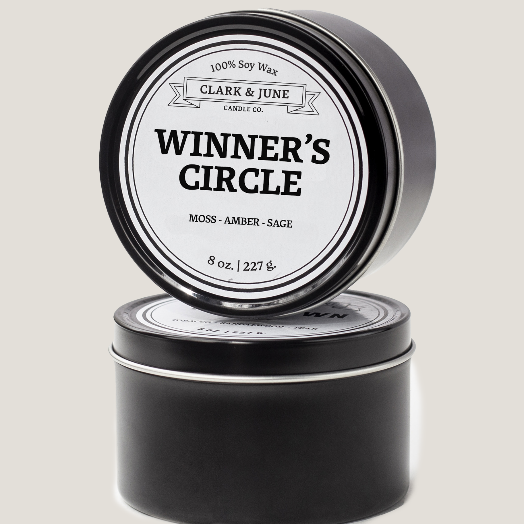 Single wicked 8oz candle in a black finish with Winner's Circle on the label. SEO Text –soy wax candle, Kentucky candle, hand poured, small batch, scented candle, Woman Owned, local candle, Housewarming present, gives back, charity, community candle, closing gift.