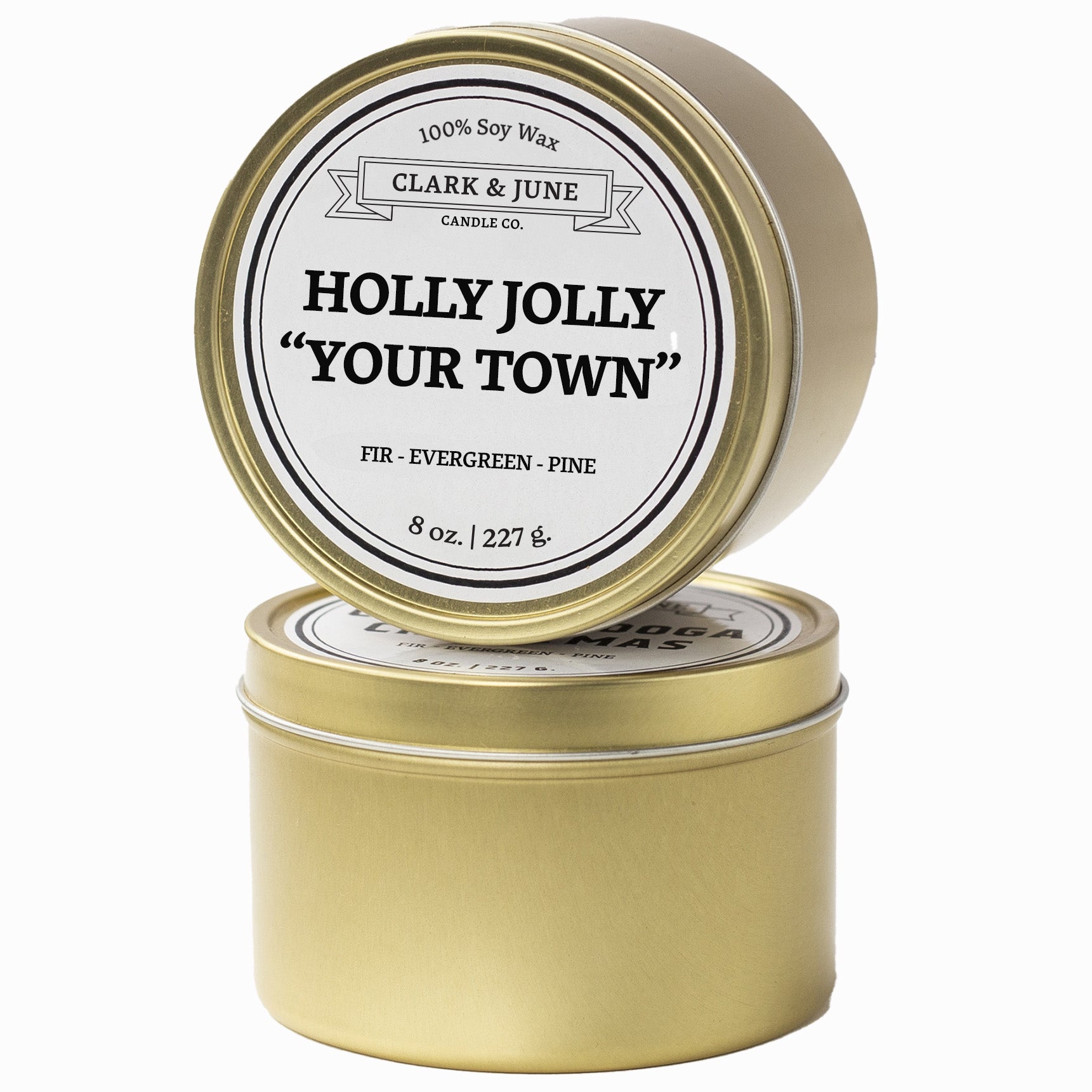 Single wicked Fir - Evergreen - Pine scented 8oz candle in gold finish with Holly Jolly "Your Town" on the label. SEO Text –soy wax candle, Christmas candle, Holiday candle hand poured, small batch, scented candle, Woman Owned, local candle, Housewarming present, gives back, charity, community candle, Soy wax candle Christmas gift.