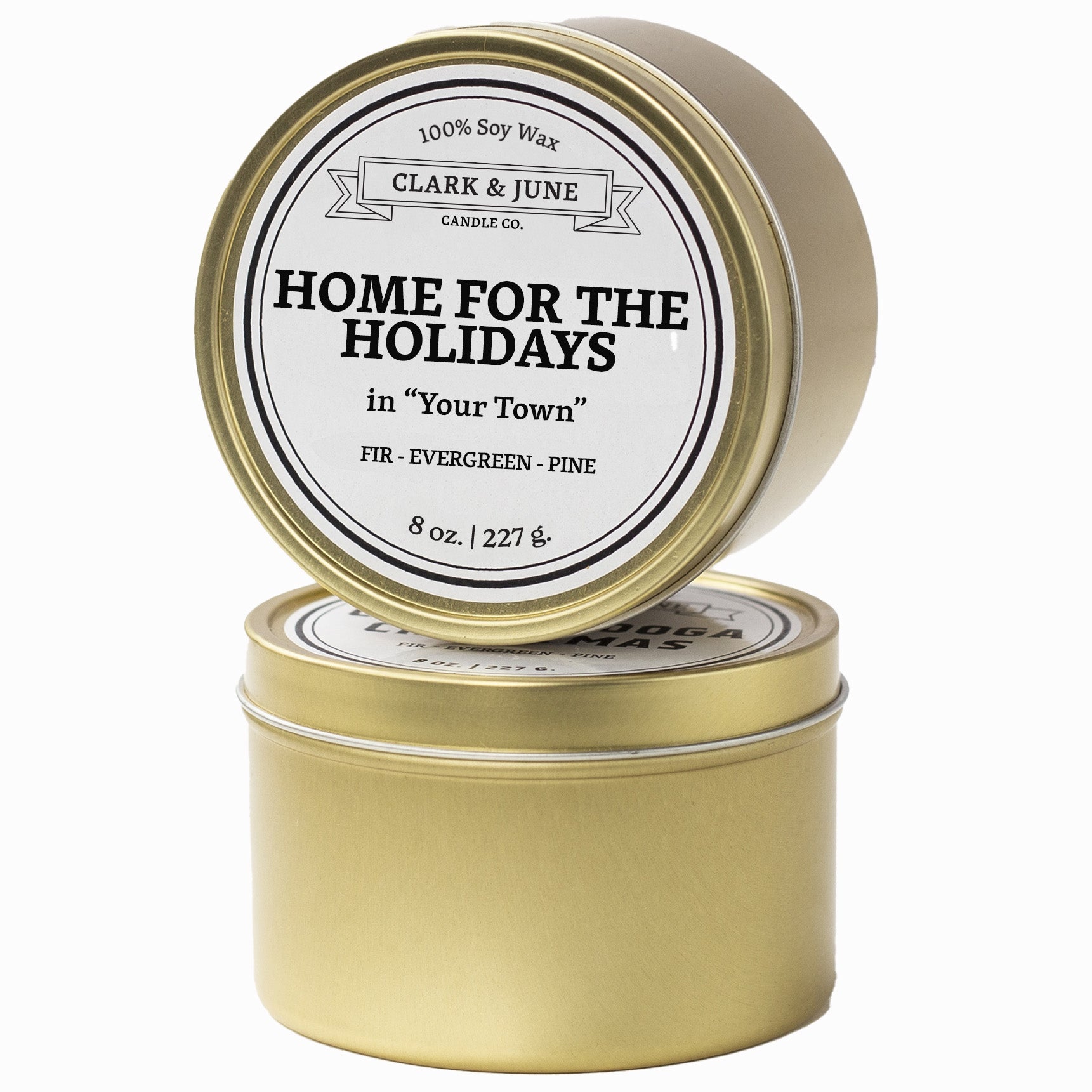 Single wicked Fir - Evergreen - Pine scented 8oz candle in gold finish with Home for the Holidays in "Your Town" on the label. SEO Text –soy wax candle, Christmas candle, Holiday candle hand poured, small batch, scented candle, Woman Owned, local candle, Housewarming present, gives back, charity, community candle, Soy wax candle Christmas gift.