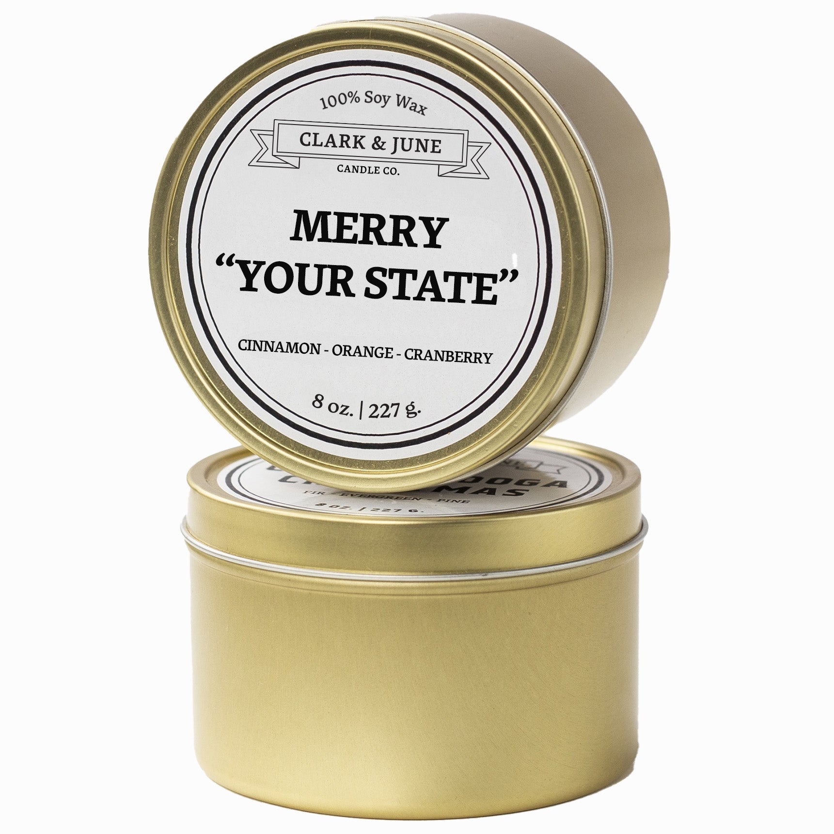 Single wicked Cinnamon - Orange - Cranberry  scented 8oz candle in gold finish with Merry "Your State" on the label. SEO Text –soy wax candle, Christmas candle, Holiday candle hand poured, small batch, scented candle, Woman Owned, local candle, Housewarming present, gives back, charity, community candle, Soy wax candle Christmas gift.
