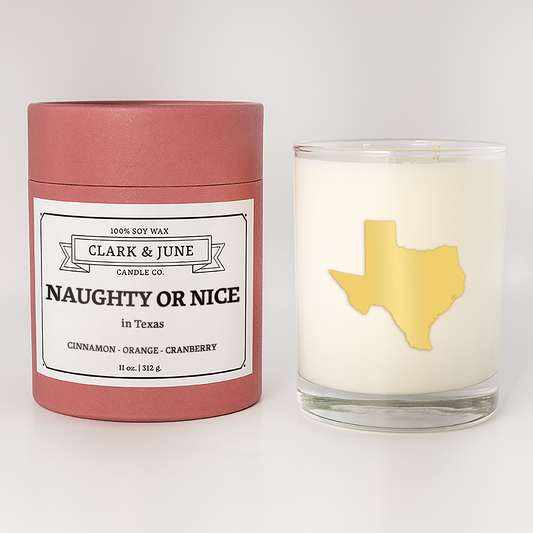 Double wicked soy candle in a 13.5 oz tumbler with the state of  Texas printed in 22k gold foil on the face. Red cylinder packaging with Naughty or Nice on the label. SEO Text – Drinking glass, soy wax candle, Christmas Candle, hand poured, small batch, scented candle, Woman Owned, local candle, Housewarming present, gives back, charity, community candle, becomes a cocktail glass, closing gift.