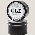 Load image into Gallery viewer, Single wicked 8oz candle in a black finish with “North Carolina” on the label. SEO Text –soy wax candle, Alabama candle, hand poured, small batch, scented candle, Woman Owned, local candle, Housewarming present, gives back, charity, community candle, closing gift.