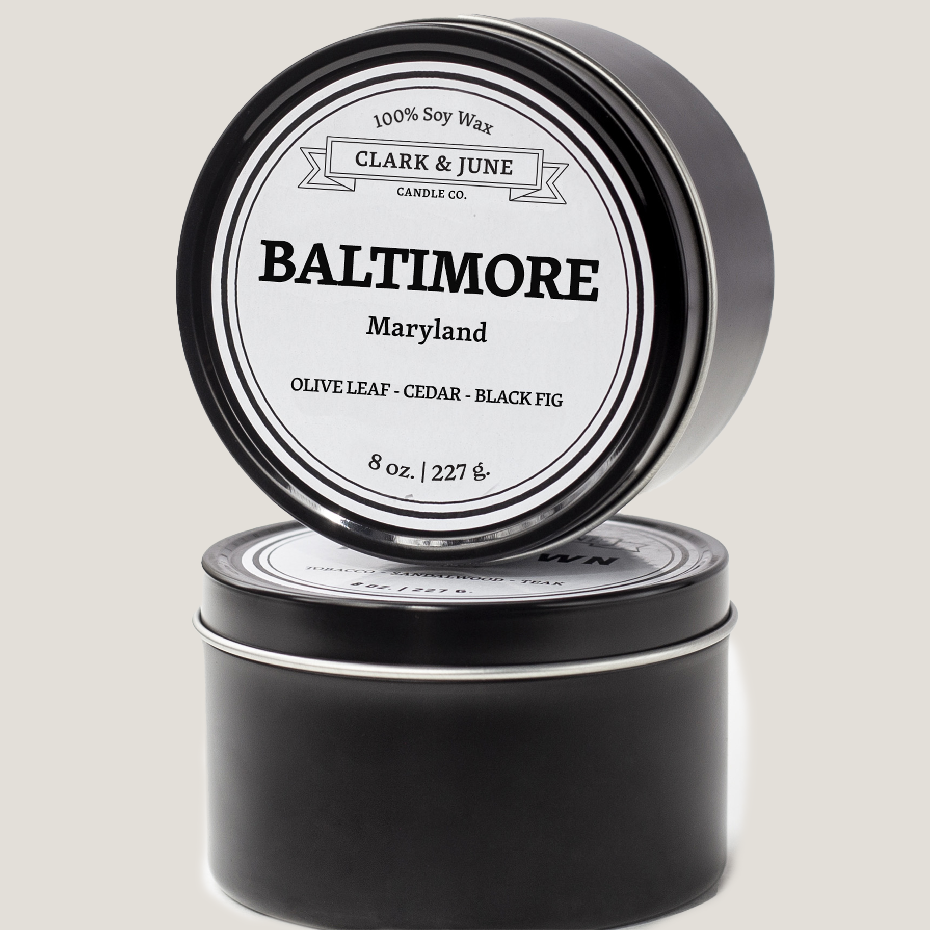 Single wicked 8oz candle in a black finish with Baltimore on the label. SEO Text –soy wax candle, Maryland candle, hand poured, small batch, scented candle, Woman Owned, local candle, Housewarming present, gives back, charity, community candle, closing gift. 
