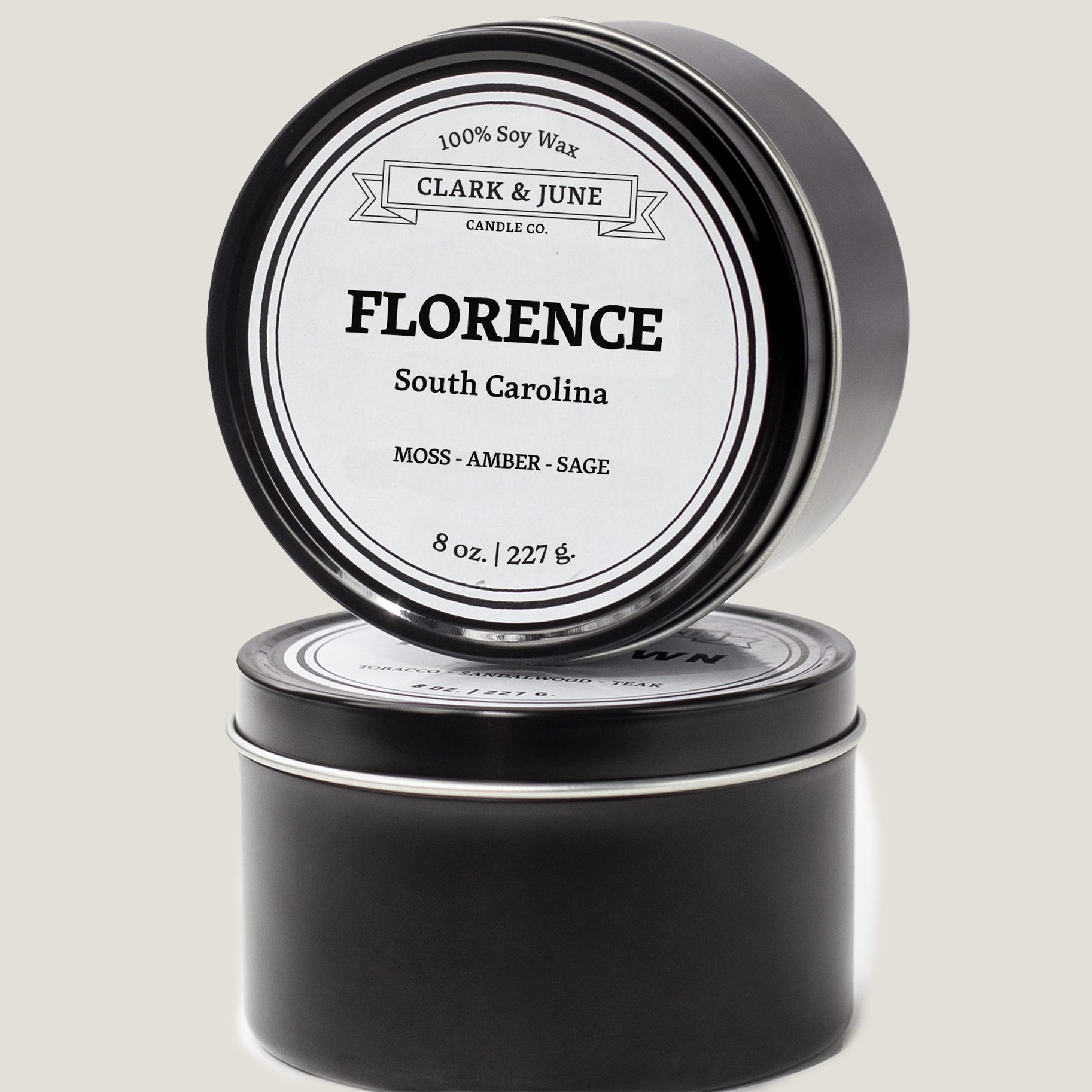 Single wicked 8oz candle in a black finish with Florence  on the label. SEO Text –soy wax candle, South Carolina candle, hand poured, small batch, scented candle, Woman Owned, local candle, Housewarming present, gives back, charity, community candle, closing gift. 
