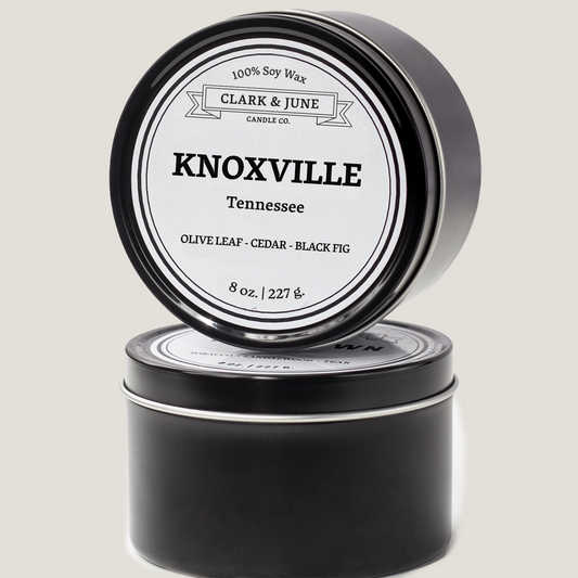 Single wicked 8oz candle in a black finish with “Knoxville” on the label. SEO Text –soy wax candle, Alabama candle, hand poured, small batch, scented candle, Woman Owned, local candle, Housewarming present, gives back, charity, community candle, closing gift. 