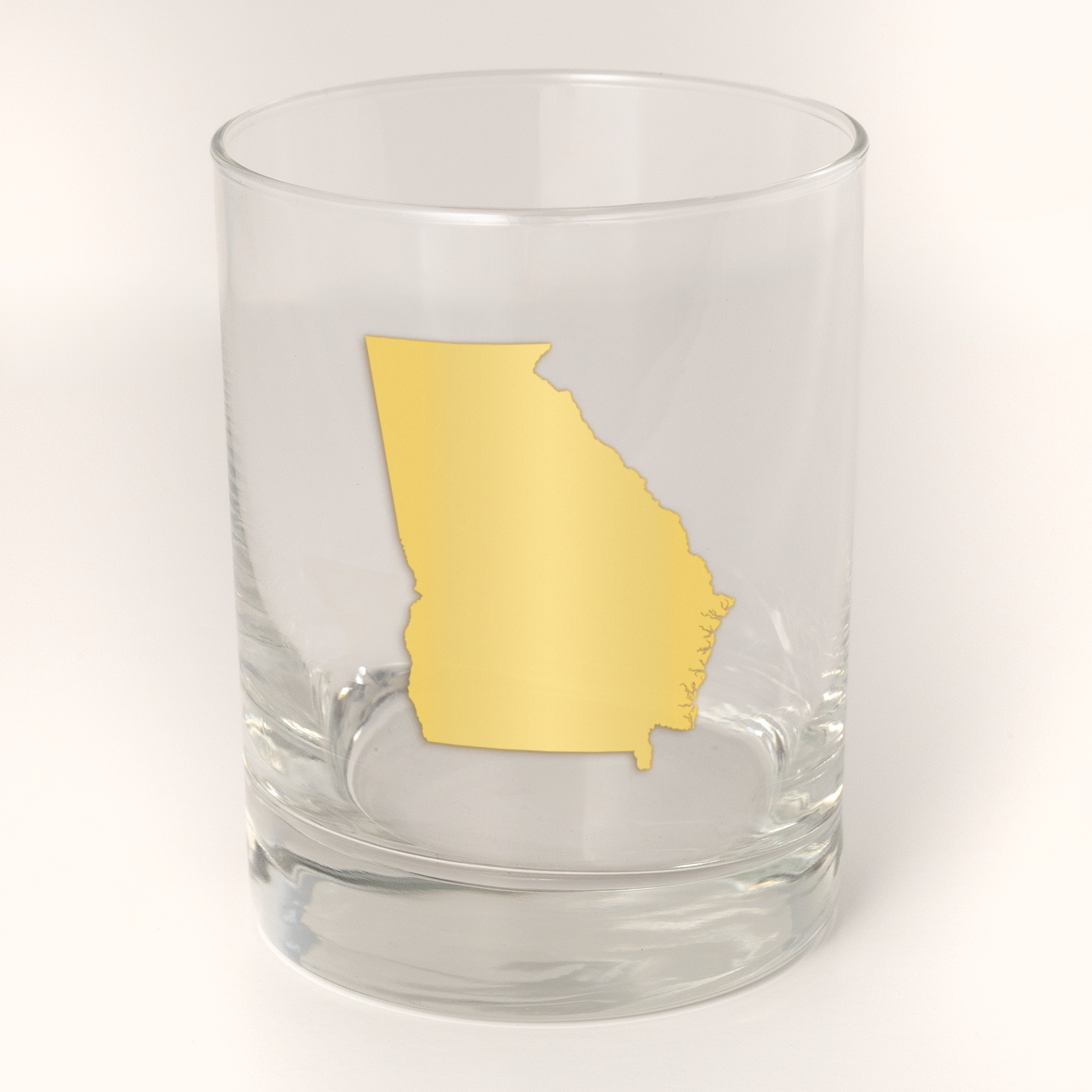 13.5oz Old Fashioned Rocks Glass with the state of Missouri silhouetted in 22k gold foil on the face.  Drinking Glass