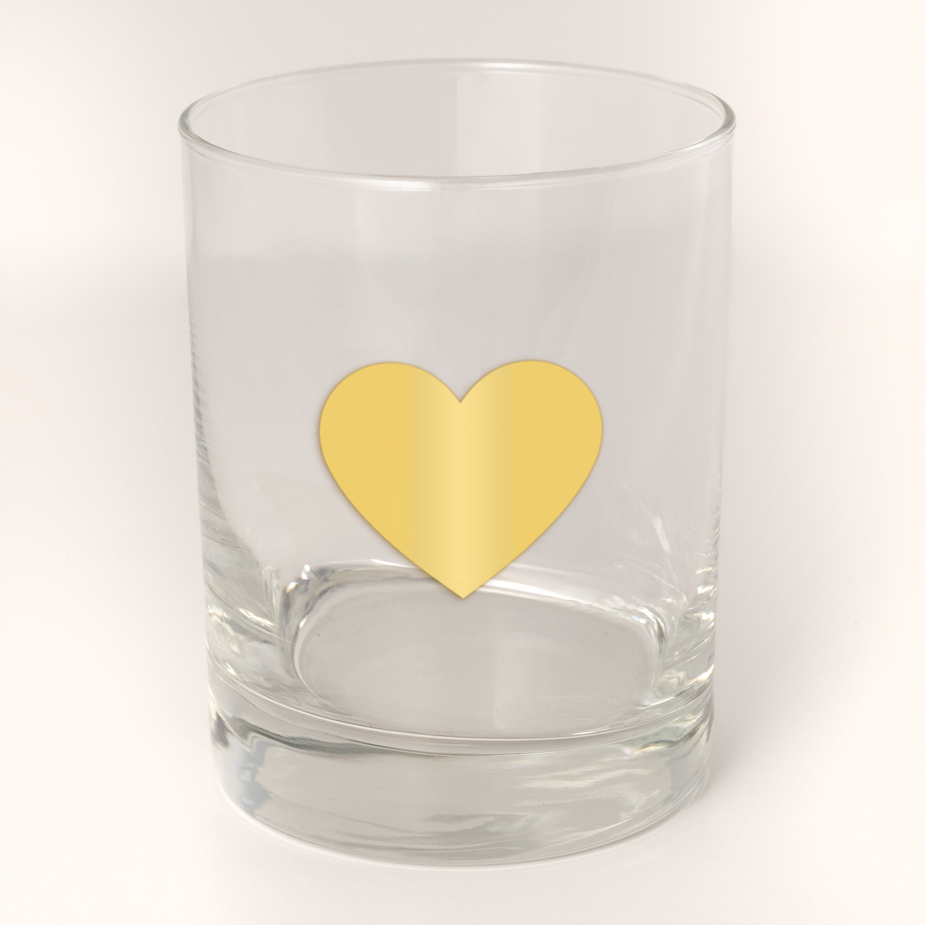 13.5oz Old Fashioned Rocks Glass with a heart silhouetted in 22k gold foil on the face.  Drinking Glass