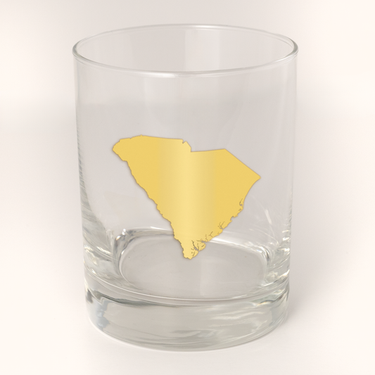 13.5oz Old Fashioned Rocks Glass with the state of South Carolina silhouetted in 22k gold foil on the face. Drinking Glass