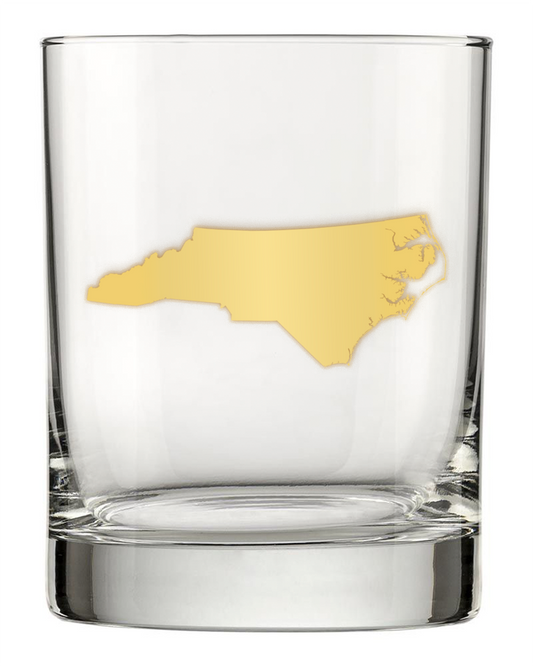 13.5oz Old Fashioned Rocks Glass with the state of North Carolina silhouetted in 22k gold foil on the face. Drinking Glass