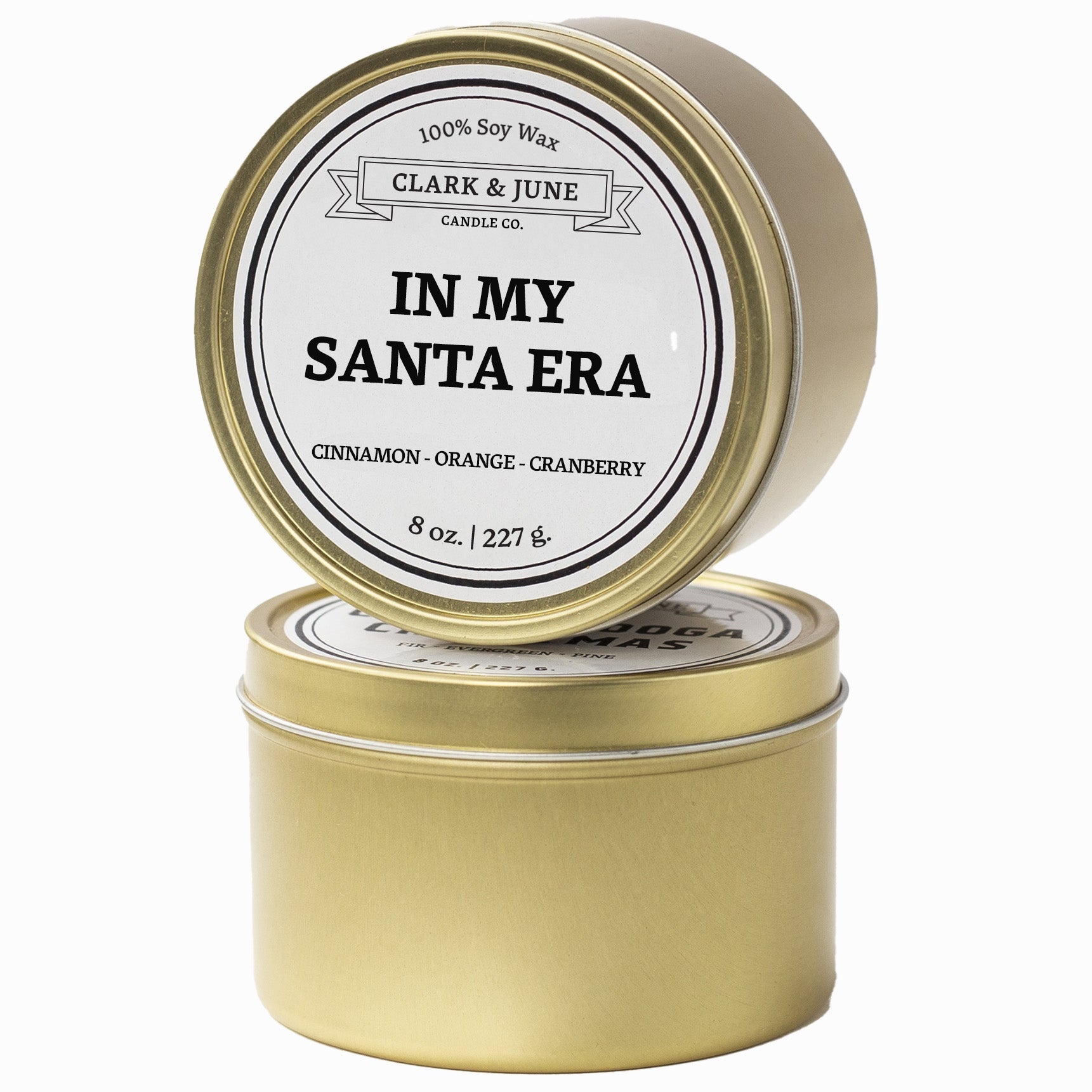 Single wicked Cinnamon - Orange - Cranberry  scented 8oz candle in gold finish with In My Santa Era on the label. SEO Text –soy wax candle, Christmas candle, Holiday candle hand poured, small batch, scented candle, Woman Owned, local candle, Housewarming present, gives back, charity, community candle, Soy wax candle Christmas gift.
