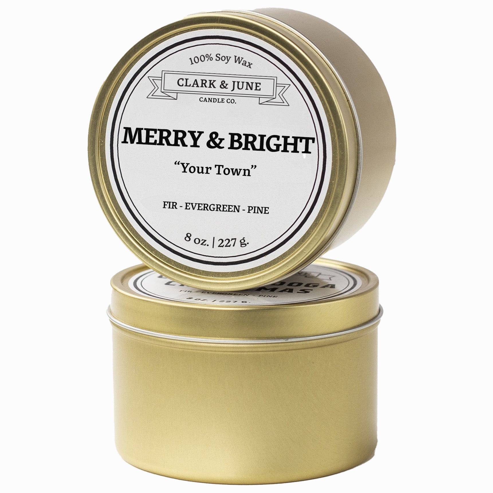 Single wicked Fir - Evergreen - Pine scented 8oz candle in gold finish with Merry Bright "Your Town" on the label. SEO Text –soy wax candle, Christmas candle, Holiday candle hand poured, small batch, scented candle, Woman Owned, local candle, Housewarming present, gives back, charity, community candle, Soy wax candle Christmas gift.
