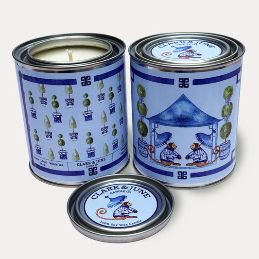 14oz Monkey Tea Time design soy wax candle in a pint sized paint can made by Clark & June Candle Co. The candle is wrapped with a blue label showing a repeating chinoiserie topiary design of the back and two monkeys sitting under a pagoda with umbrellas. The scent is Ozone – Linen – White Tea and was hand poured in small batches. 

Monkey Candle, Scented Candle, Paint Can Candle. Single Cotton Wick
