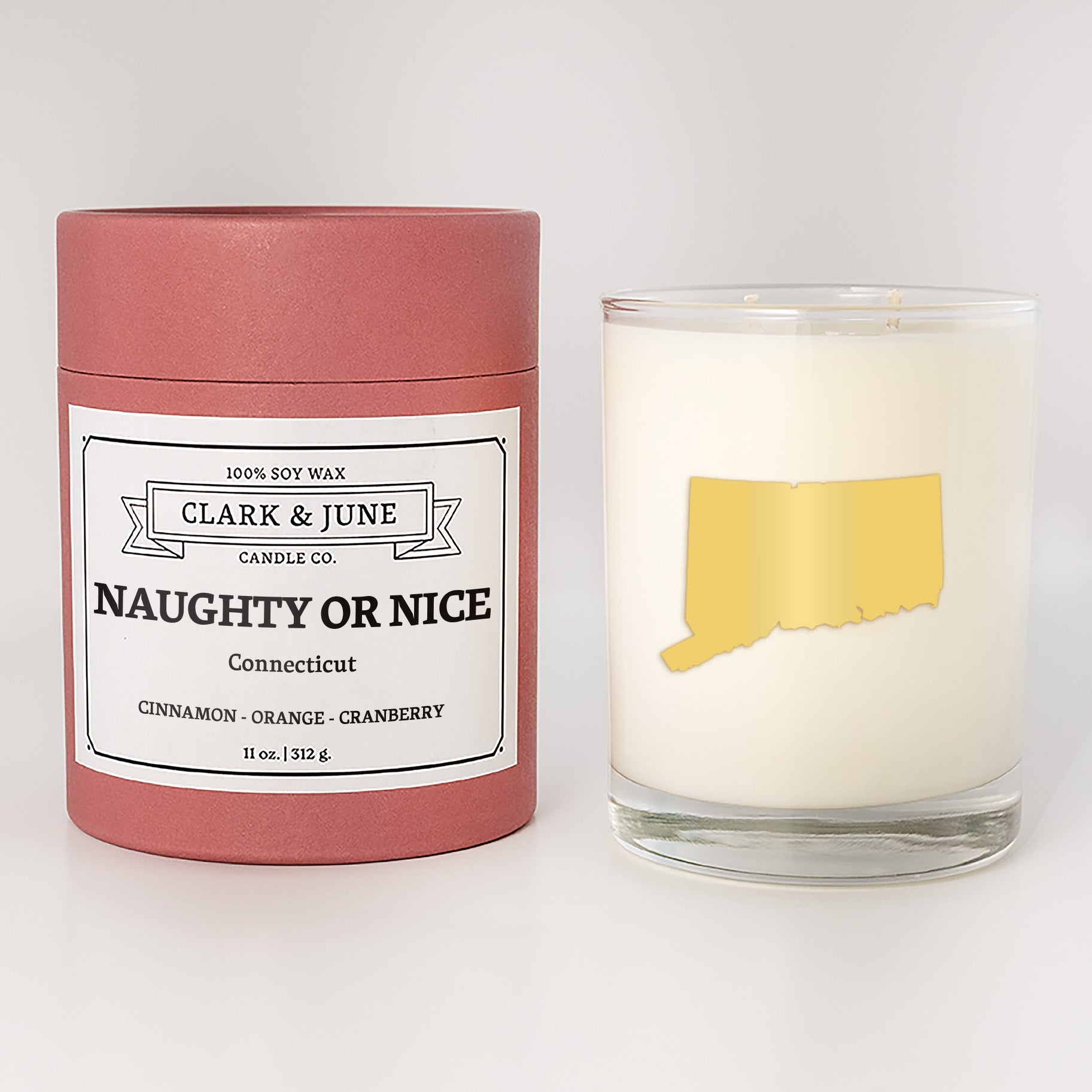 Double wicked soy candle in a 13.5 oz tumbler with the state of  Connecticut printed in 22k gold foil on the face. Red cylinder packaging with Naughty or Nice in Connecticut on the label. SEO Text â€“ Drinking glass, soy wax candle, Christmas Candle, hand poured, small batch, scented candle, Woman Owned, local candle, Housewarming present, gives back, charity, community candle, becomes a cocktail glass, closing gift. 
