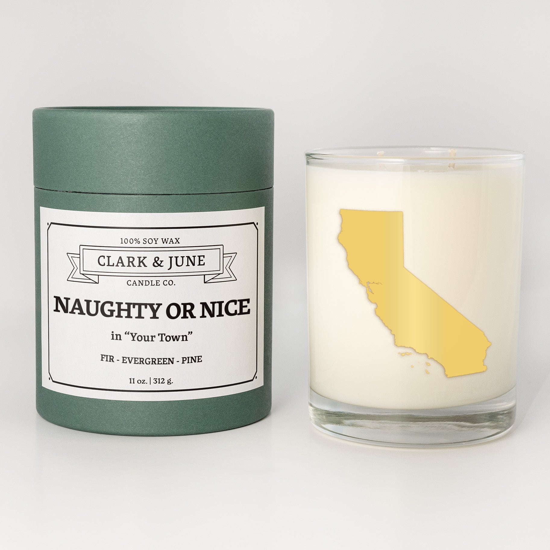 Double wicked soy candle in a 13.5 oz tumbler with the state of California printed in 22k gold foil on the face. Green cylinder packaging with Naughty or Nice in "Your Town" on the label. SEO Text â€“ Drinking glass, soy wax candle, Christmas Candle, hand poured, small batch, scented candle, Woman Owned, local candle, Housewarming present, gives back, charity, community candle, becomes a cocktail glass, closing gift. 
