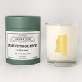 Load image into Gallery viewer, Double wicked soy candle in a 13.5 oz tumbler with the state of   Mississippi printed in 22k gold foil on the face. Green cylinder packaging with Naughty or Nice in "Your Town" on the label. SEO Text â€“ Drinking glass, soy wax candle, Christmas Candle, hand poured, small batch, scented candle, Woman Owned, local candle, Housewarming present, gives back, charity, community candle, becomes a cocktail glass, closing gift. 

