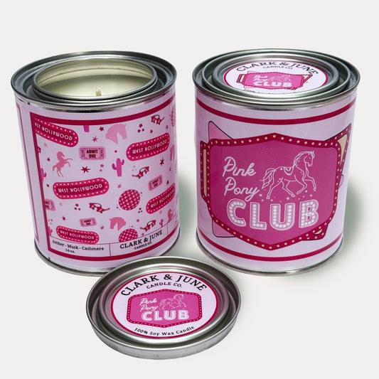 14oz Pink Pony Club design soy wax candle in a pint sized paint can made by Clark & June Candle Co. The candle is wrapped with a pink  label showing smattering of ponies, cacti, tickets and stars on the back and a marquee sign of the Pink Pony Club in lights  on the front. The scent is Amber – Musk - Cashmere and was hand poured in small batches. 

Scented Candle, Paint Can Candle. Single Cotton Wick, Chappell Roan
