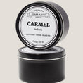 Load image into Gallery viewer, Single wicked 8oz candle in a black finish with “North Carolina” on the label. SEO Text –soy wax candle, Alabama candle, hand poured, small batch, scented candle, Woman Owned, local candle, Housewarming present, gives back, charity, community candle, closing gift. 
