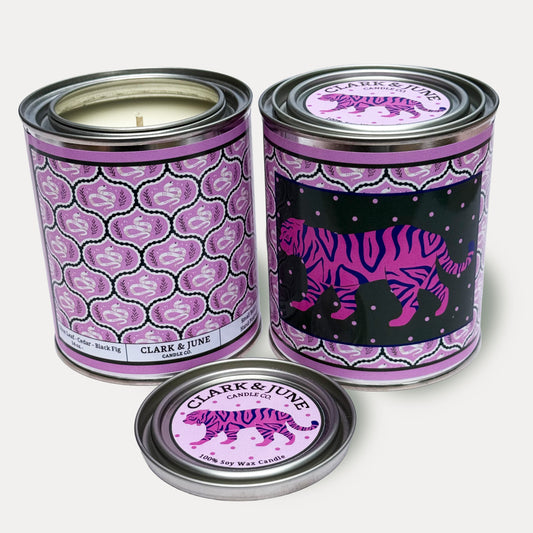 14oz Tiger design soy wax candle in a pint sized paint can made by Clark & June Candle Co. The candle is wrapped with a lavender  label showing a repeating design of snakes and leaves on the back and a prowling tiger front. The scent is Olive Leaf – Cedar – Black Fig and was hand poured in small batches. 

Tiger Candle, Scented Candle, Paint Can Candle. Single Cotton Wick
