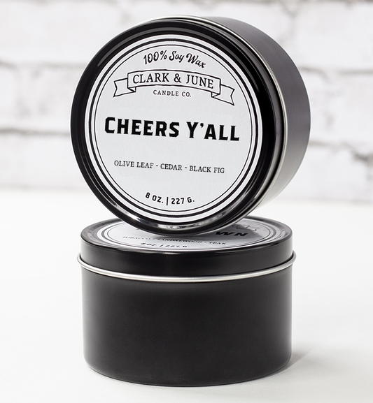Single wicked 8oz candle in a black finish with “Cheers Y’All ” on the label. SEO Text –soy wax candle, Alabama candle, hand poured, small batch, scented candle, Woman Owned, local candle, Housewarming present, gives back, charity, community candle, closing gift. 