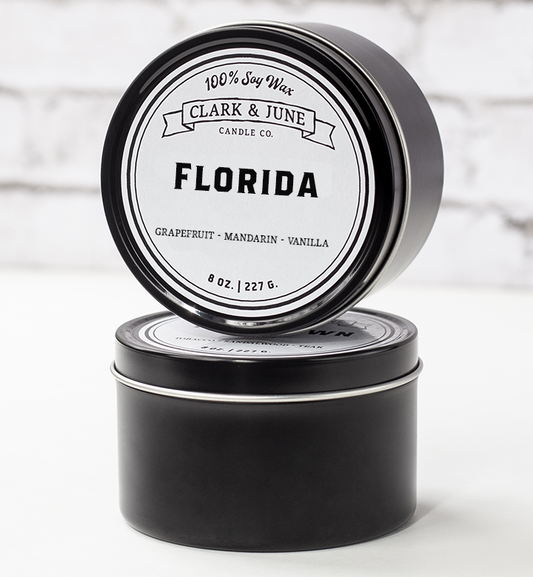 Single wicked 8oz candle in a black finish with “Florida ” on the label. SEO Text –soy wax candle, Alabama candle, hand poured, small batch, scented candle, Woman Owned, local candle, Housewarming present, gives back, charity, community candle, closing gift. 