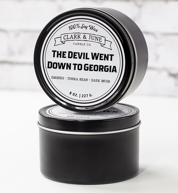 Single wicked 8oz candle in a black finish with “The Devil Went Down To Georgia” on the label. SEO Text –soy wax candle, Alabama candle, hand poured, small batch, scented candle, Woman Owned, local candle, Housewarming present, gives back, charity, community candle, closing gift. 