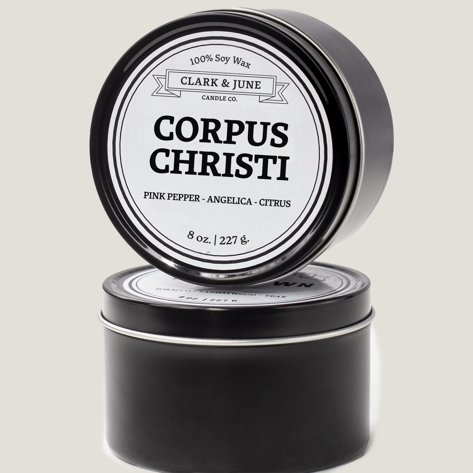 Single wicked 8oz candle in a black finish with Corpus Christi  on the label. SEO Text –soy wax candle, Texas candle, hand poured, small batch, scented candle, Woman Owned, local candle, Housewarming present, gives back, charity, community candle, closing gift. 
