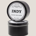 Load image into Gallery viewer, Single wicked 8oz candle in a black finish with “North Carolina” on the label. SEO Text –soy wax candle, Alabama candle, hand poured, small batch, scented candle, Woman Owned, local candle, Housewarming present, gives back, charity, community candle, closing gift. 
